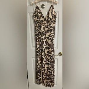 Beautiful nude, gold, brown sequin dress. Half zip up, lace up back.